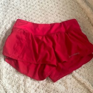 Brooks running red shorts
